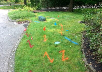 An empty ground with orange and blue markings.