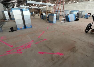 A warehouse with orange markings on the floor.